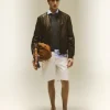 Bomber in pelle con dettagli in maglina elastica