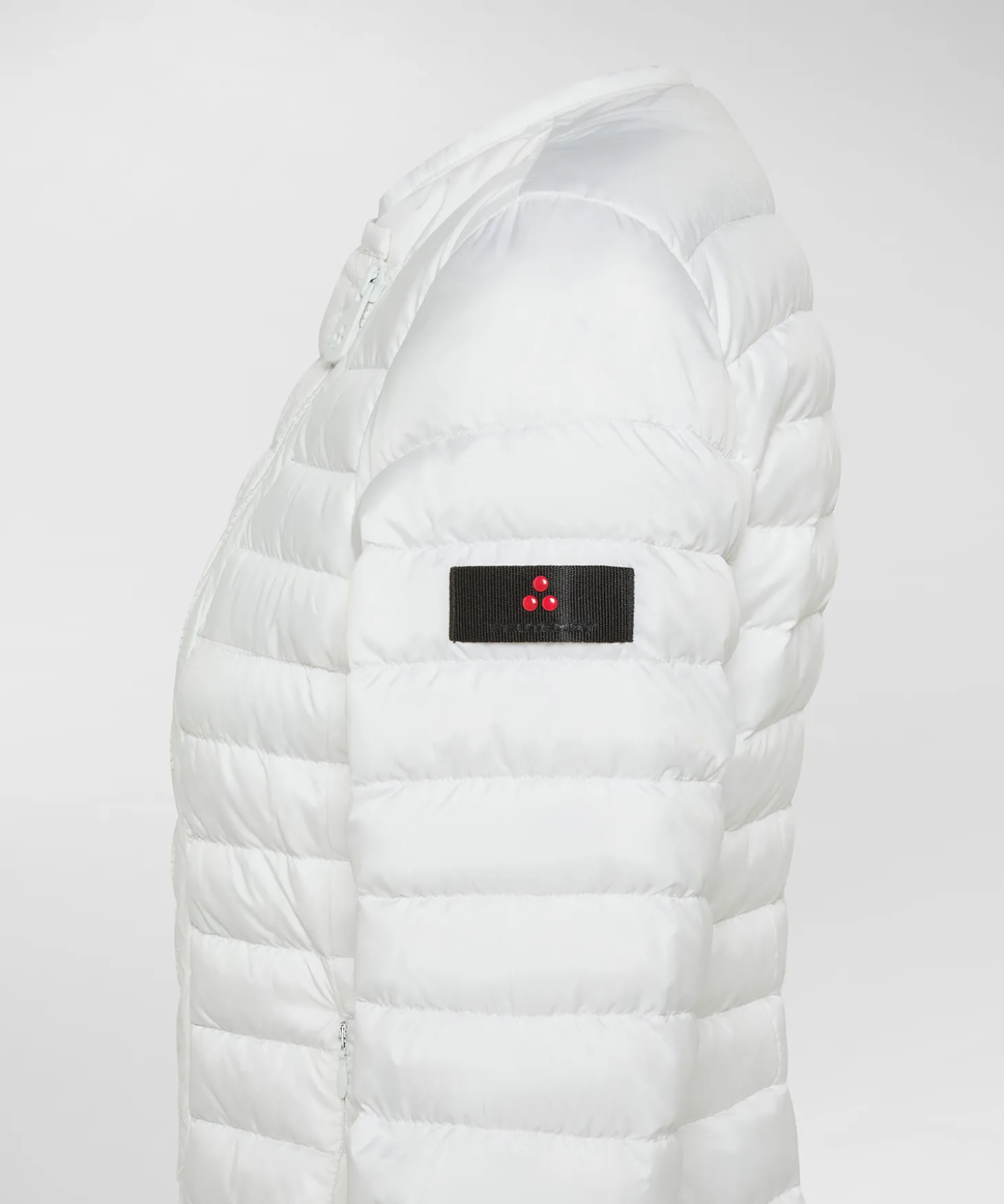 Piumino avvitato con zip obliqua