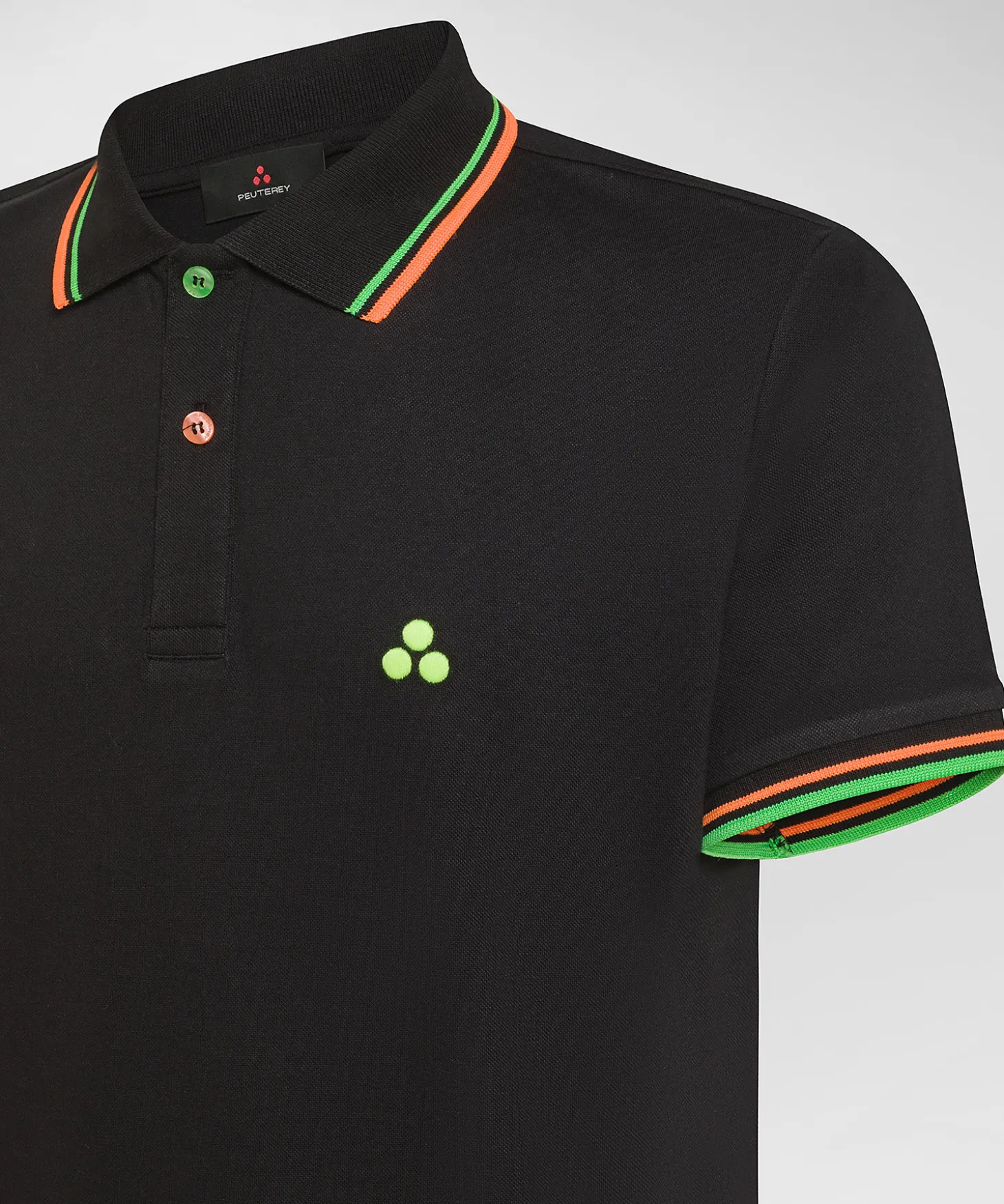 Polo in piqué di cotone stretch con dettagli fluo