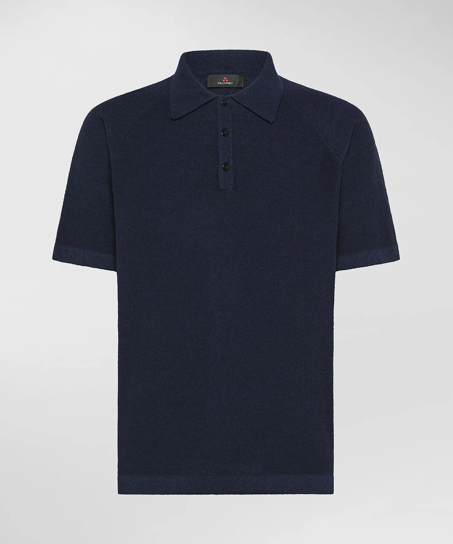 Polo in tricot misto di cotone e nylon effetto spugna