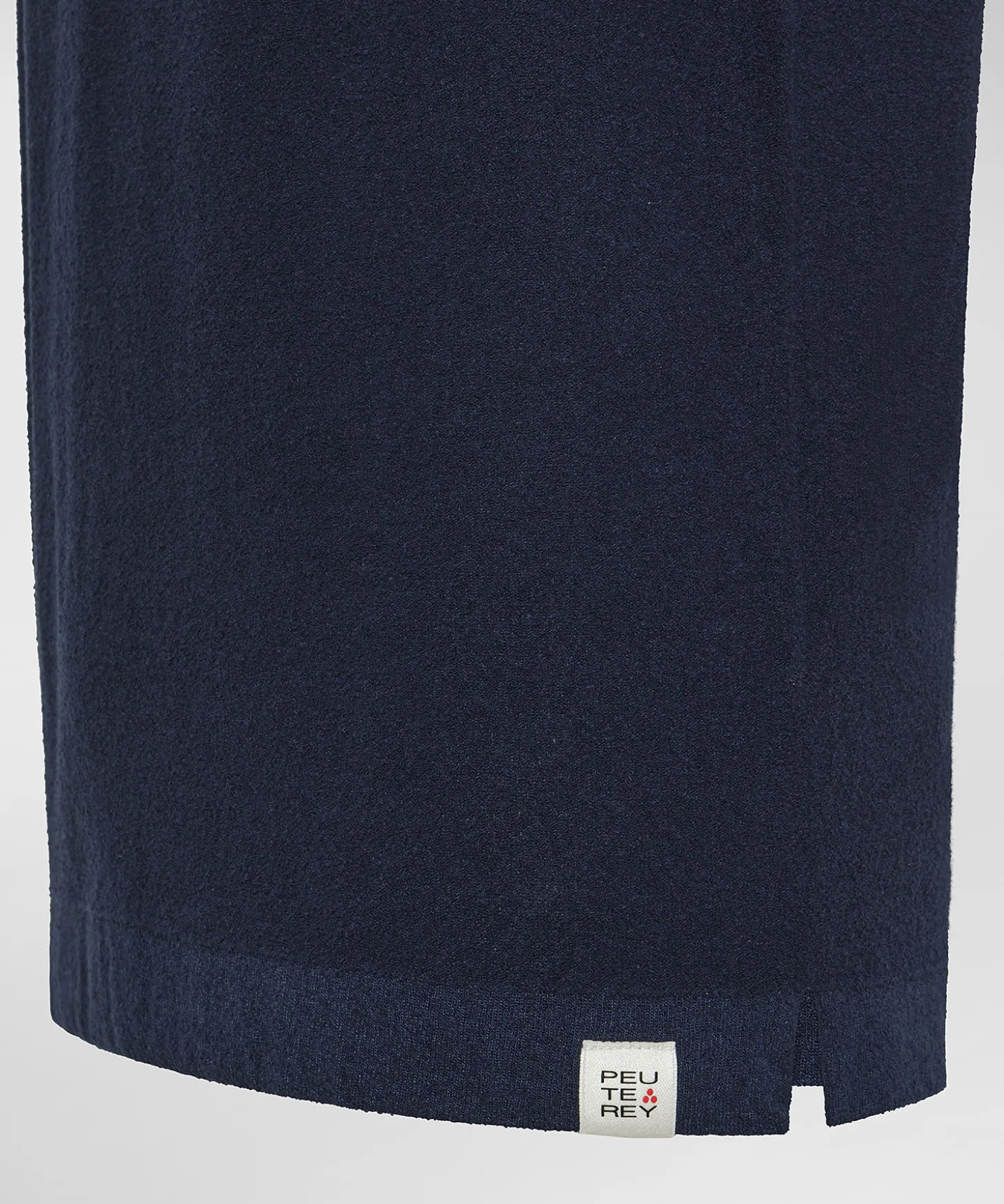 Polo in tricot misto di cotone e nylon effetto spugna