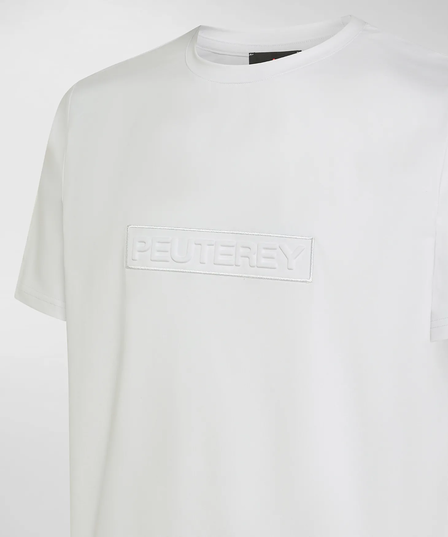 T-shirt con scritta in rilievo