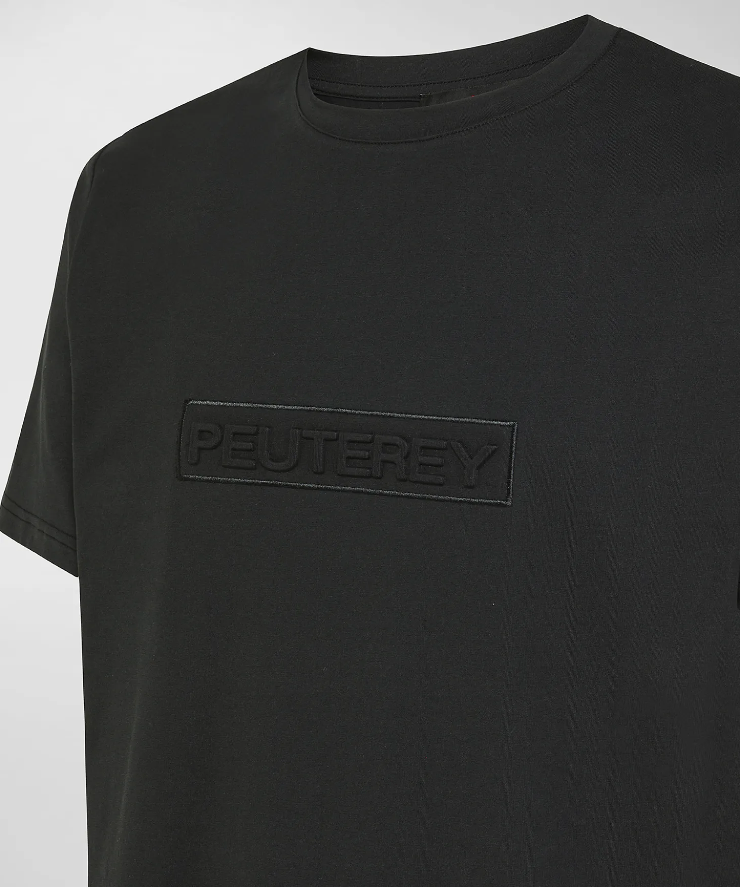 T-shirt con scritta in rilievo