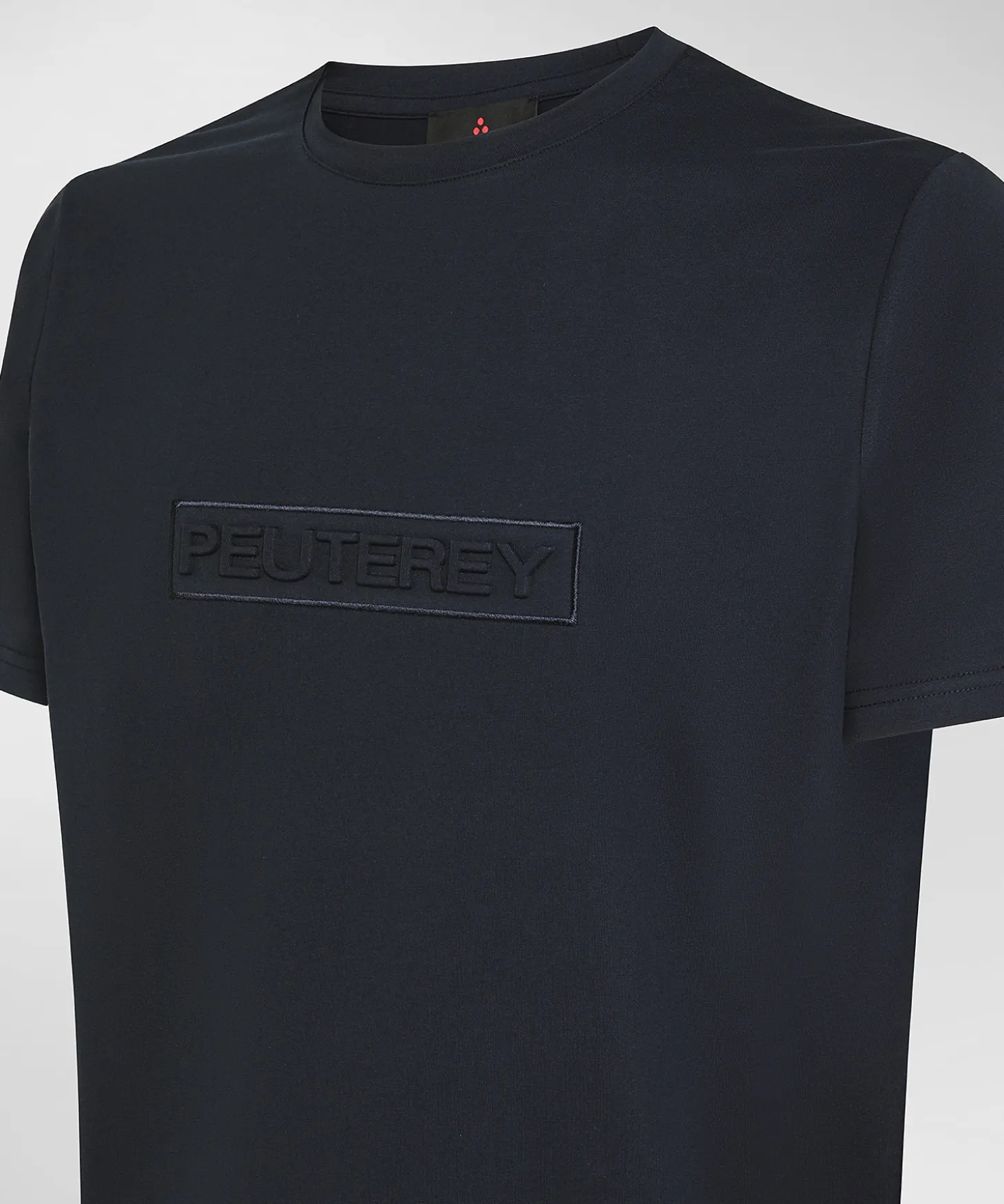 T-shirt con scritta in rilievo