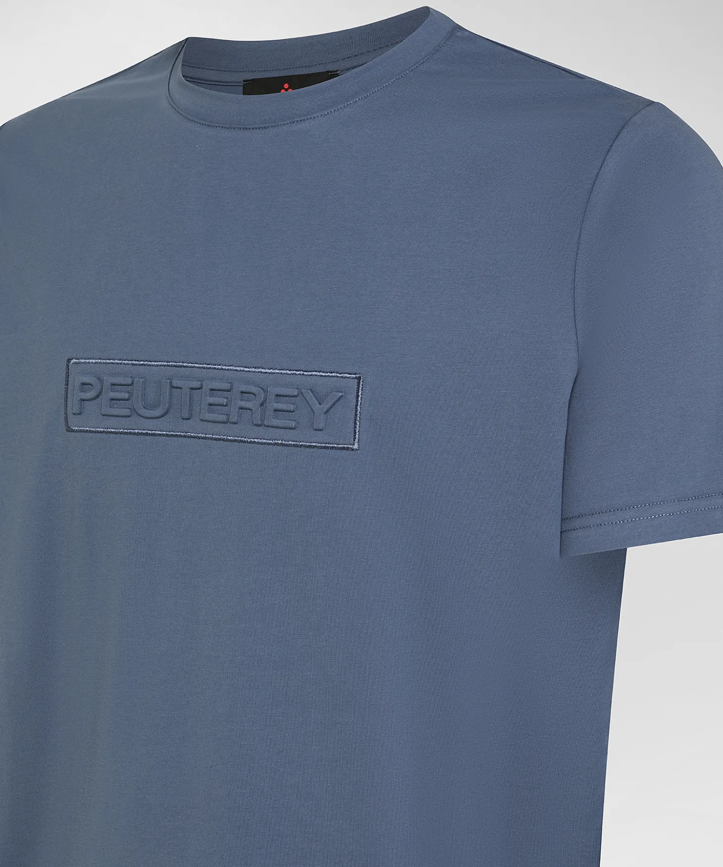 T-shirt con scritta in rilievo